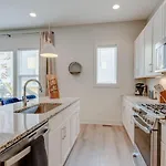 Holiday home Harmony Of Dual Townhomes With 14 Beds
