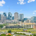 Spacious 3-Story Townhome W Rooftop & City Views