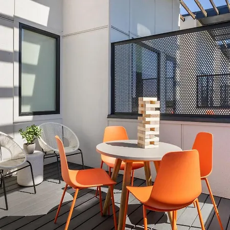 Sleeps 44 4 Themed Lofts W Skyline Balconies Neon Backdrops Glam Kitchens—perfect For Group The Swift Retreat By Avantstay Nashville