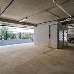Three-Level West End Apartment With Private Office And Free Secured Parking