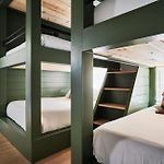Stylish 3 Bed Retreat, Rooftop, Parking, Sleeps 10, Ensuite Baths, Bunk Room, Gourmet Kitchen, Cozy Living Space, Rooftop Views & Fire Table, Near Downtown, Distilleries & Marathon Village, 24 Hr Hospitality