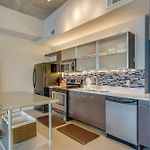 Top-Floor 5Th & Main Condo | Skyline Rooftop