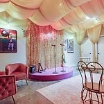 Glam Bachelorette Condo Stage & Neon Vibes
