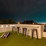 Playmate Lounge Rooftop Hot Tub Game Room
