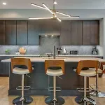Holiday home Stylish 4bed Retreat With Rooftop, Garage, Peloton, Sleeps 12, Fire Table, Gourmet Kitchen, Cozy Living Space, Dedicated Parking, Near Distilleries, Marathon Village And Nightlife, Chic Skyline Views, 24 Hour Hospitality *