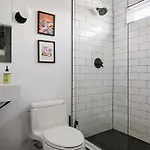 Stylish 3 Bed Retreat, Rooftop, Parking, Sleeps 10, Ensuite Baths, Bunk Room, Gourmet Kitchen, Cozy Living Space, Rooftop Views & Fire Table, Near Downtown, Distilleries & Marathon Village, 24 Hr Hospitality *