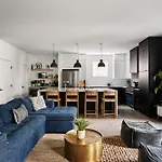 Stylish 3 Bed Retreat, Rooftop, Parking, Sleeps 10, Ensuite Baths, Bunk Room, Gourmet Kitchen, Cozy Living Space, Rooftop Views & Fire Table, Near Downtown, Distilleries & Marathon Village, 24 Hr Hospitality *