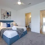 Holiday home Two Elegant Townhomes Perfect For Large Groups *
