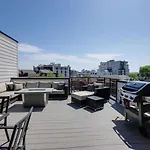 Two Townhomes Rooftop Lounges With Skyline Views