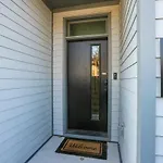 2 Side By Side Homes With Rooftops