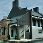 Quarters Inn & Suites