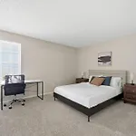 Spacious Living Room With Fireplace And Balcony