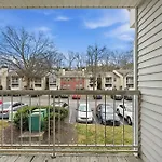 Spacious Living Room With Fireplace And Balcony