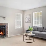Spacious Living With Fireplace And Balcony