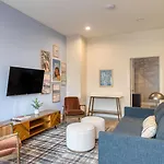 Sleeps 44 4 Themed Lofts W Skyline Balconies Neon Backdrops Glam Kitchens—Perfect For Nashville Group Stays The Swift Retreat By Avantstay