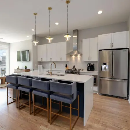 Two Townhomes Rooftop Lounges With Skyline Views