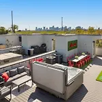 The Americana Abode Rooftop Hot Tub Game Room